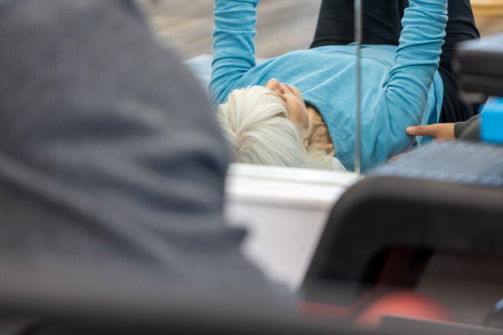 Photograph of woman receiving physiotherapy treatment
